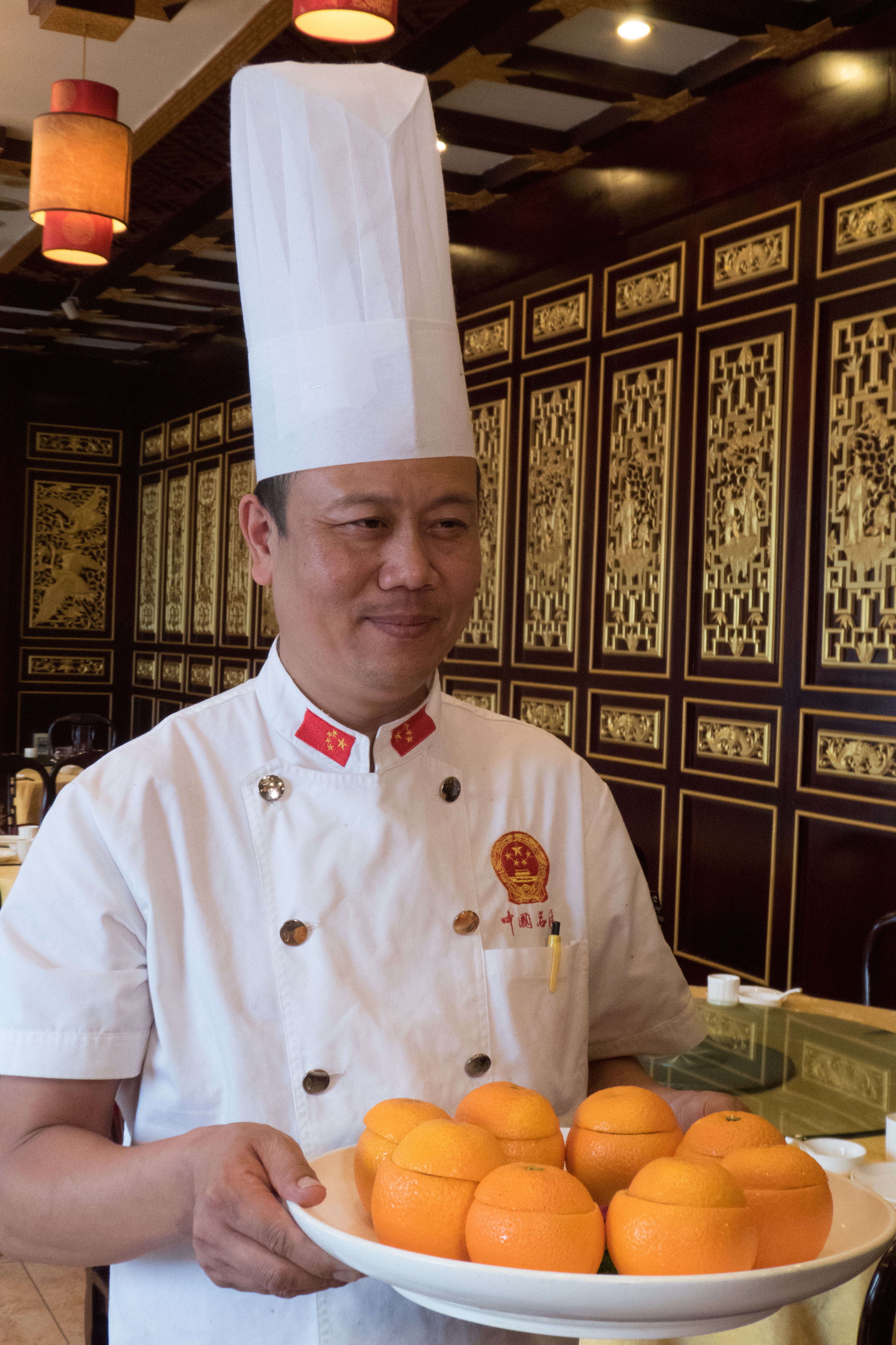 Chef serving Song dynasty dish at a restaurant in Kaifeng