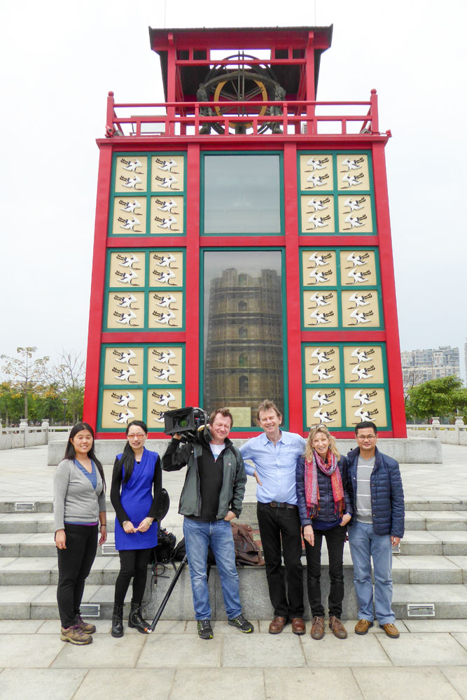 The crew in front of Su Song's astronomical clock tower, Tong'an